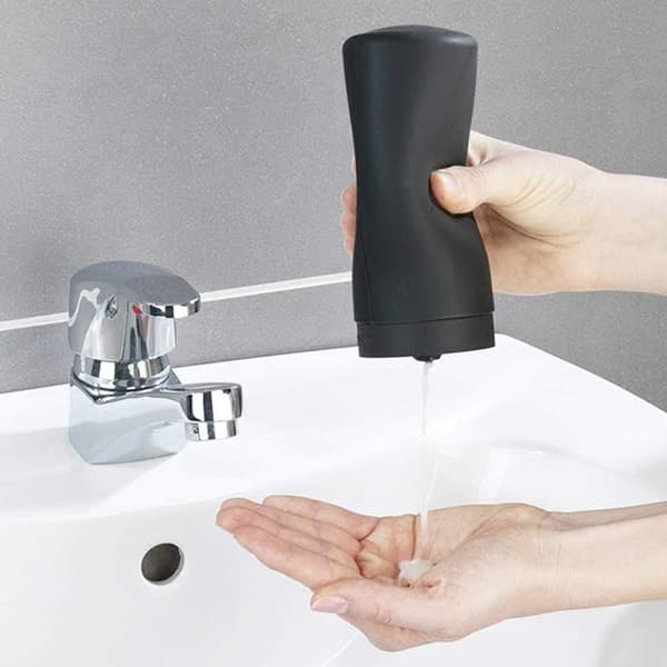 Black. Refillable dish soap dispenser, easy-squeeze silicone bottle with divider. Dispenser for hand soap, essential oil, lotion.