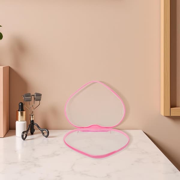 Hjerteformet reiseorganisatorveskesett i plast, rosa