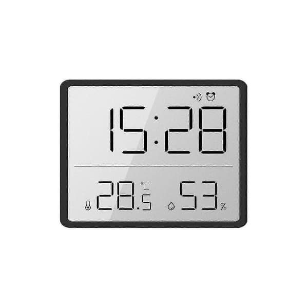 Slim LCD Electronic Digital Clock can be hung on the wall Back with magnetic suction can be H