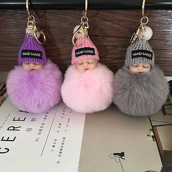 Sovende babydukke nøglering H