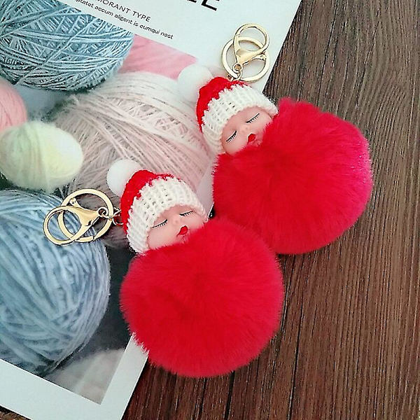 Sovende babydukke nøglering H