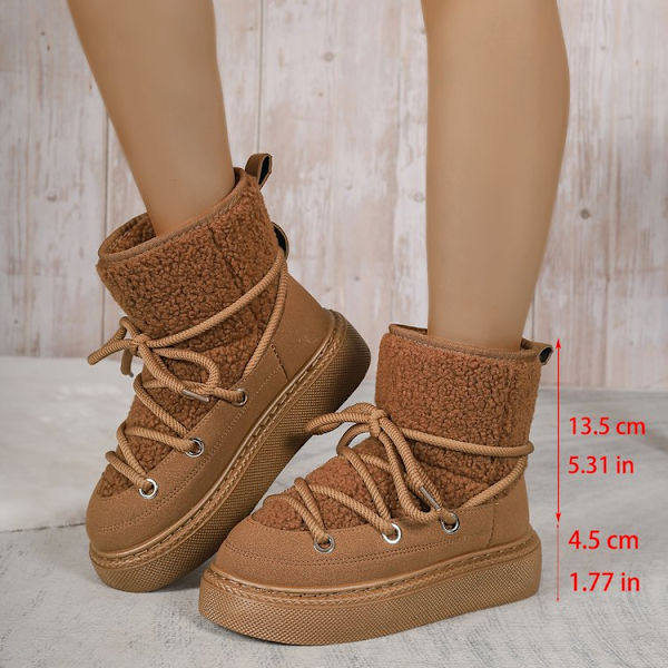 Stora, tjocka snöboots med korsband, förstärkt till mitten av vaden, inte över knät. Varma damboots. Camel 41