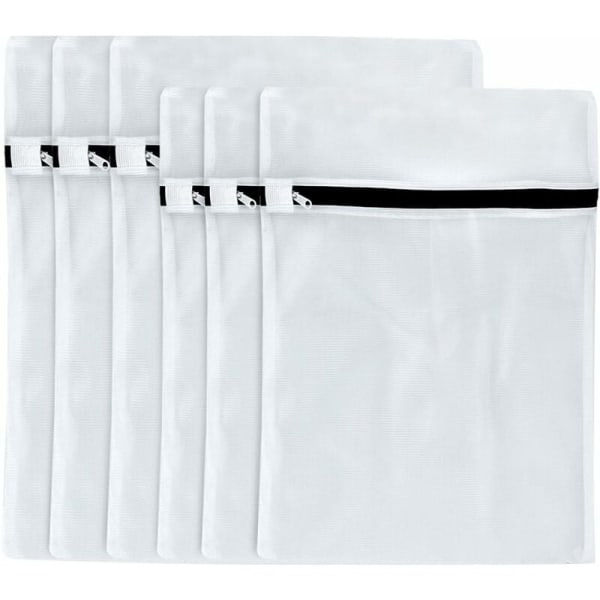 Set med 6 mellanstora svarta och vita polyester tvättpåsar, hushållsartiklar.