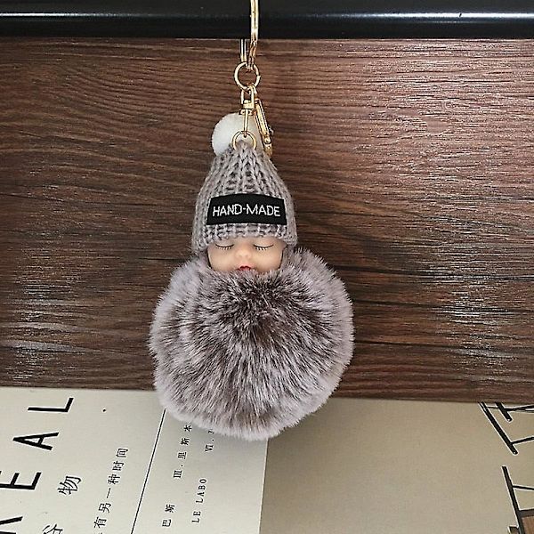 Sovende babydukke nøglering Z