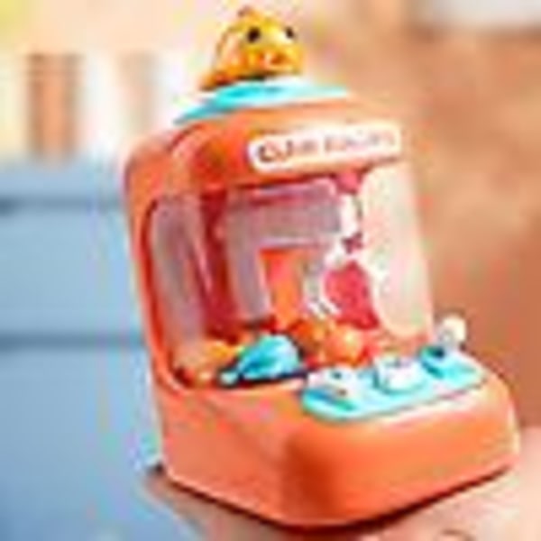 Tecknad klo Maskin Leksak Med Ljus Dockor Griping Machine Mini Catch Stuffed Machine Interaktiva leksaker for flickor Barn(Orange)