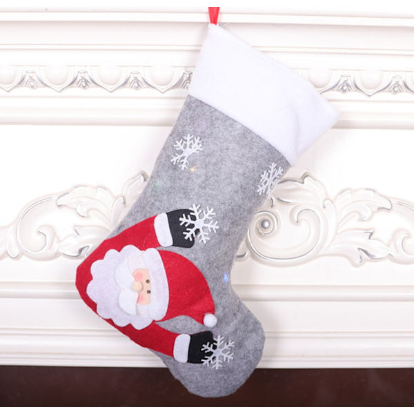 Juldekoration levererar jultomtens strumpor (senior light up strumpor + snögubbe lyser upp strumpor + rådjur lyser upp strumpor),