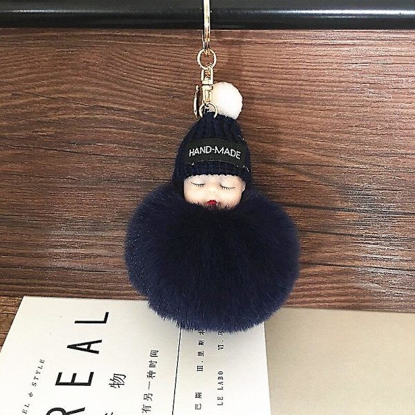 Sovende babydukke nøglering U