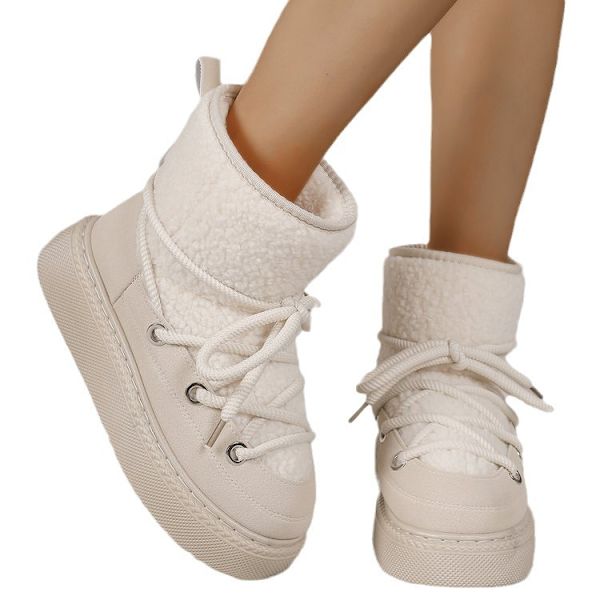 Stora, tjocka snöboots med korsband, förstärkt till mitten av vaden, inte över knät. Varma damboots. Off-White 41