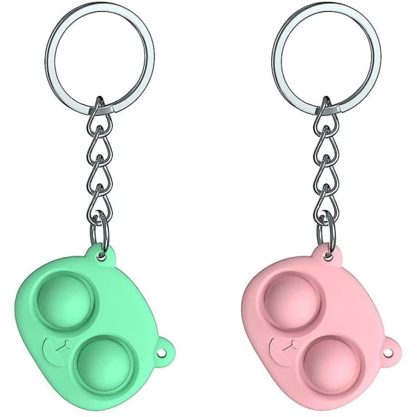 Silikondekompressionsnyckelring * 2 (rosa + grön),