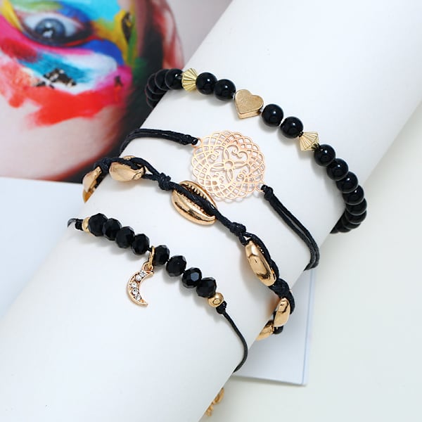 Set med 4 boho-armband med hjärtan och månar i pärlor och kristall