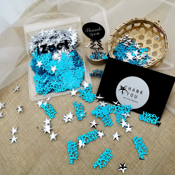 Blå "HAPPY BIRTHDAY" konfetti + Sølvstjerne Borddekorasjon.