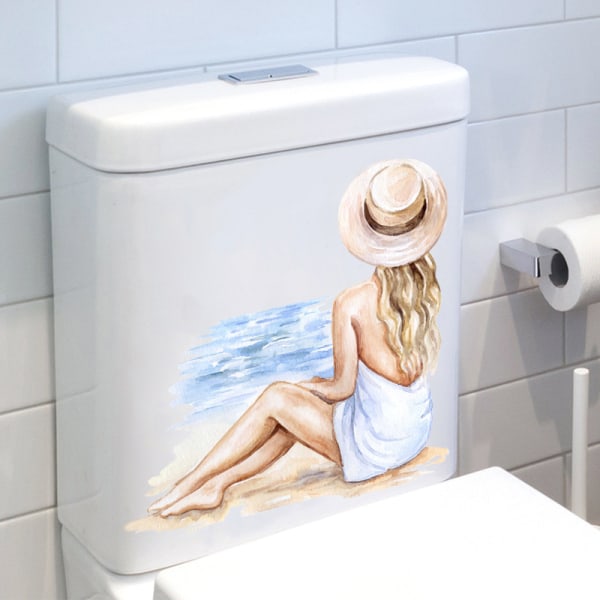 Vedenpitävä wc-tarra wc-istuimeen maalatun rantatytön selkänojaan