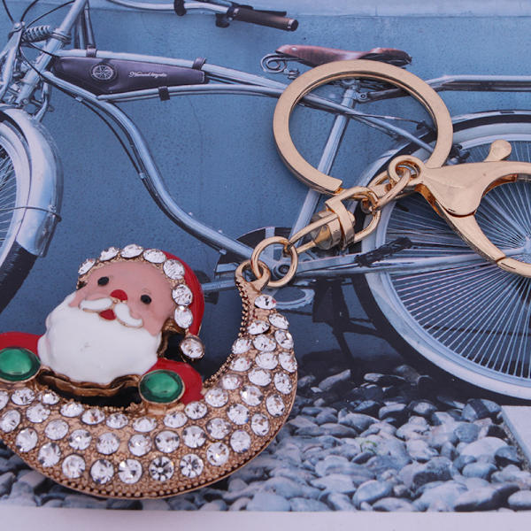 Söta jultomte-nyckelringar i legering med