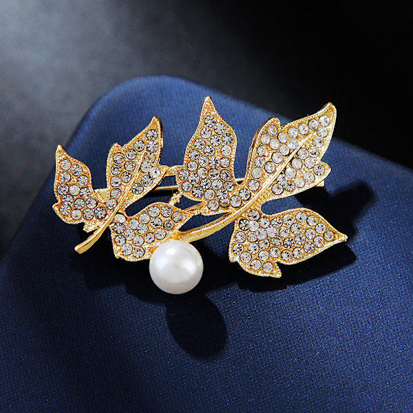 Elegant dobbelt ahornblad perle broche med diamanter