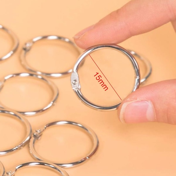 100 kpl 15 mm kirjansidontarenkaita, metallisia kansiorenkaita, kirjansidontarenkaita, kansiorenkaiden avaimenperiä, hopeisia saranoituja renkaita, rengaskansioiden sidontaan leikekirja-albumikäsitöihin