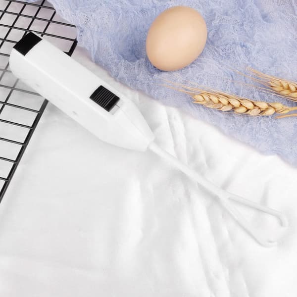 Elektrisk håndmikser for å blande egg, krem og mel
