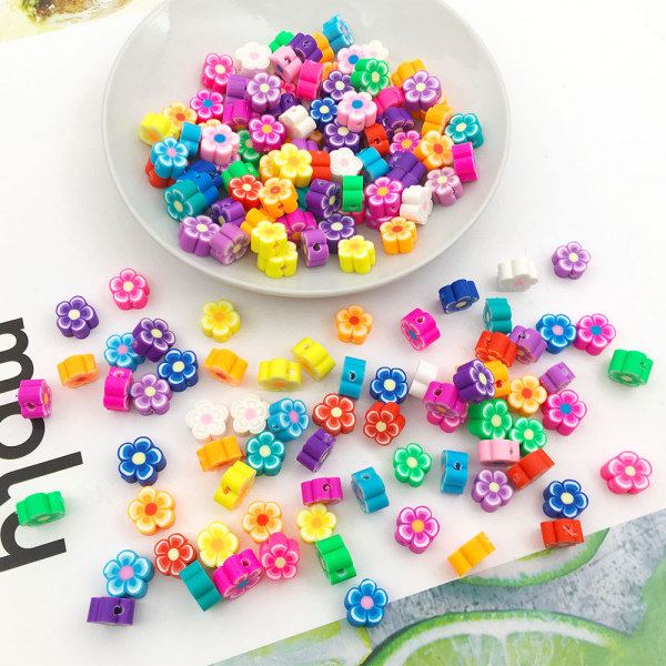 100 soft ceramic beads mixed with fruit and cartoon perforat