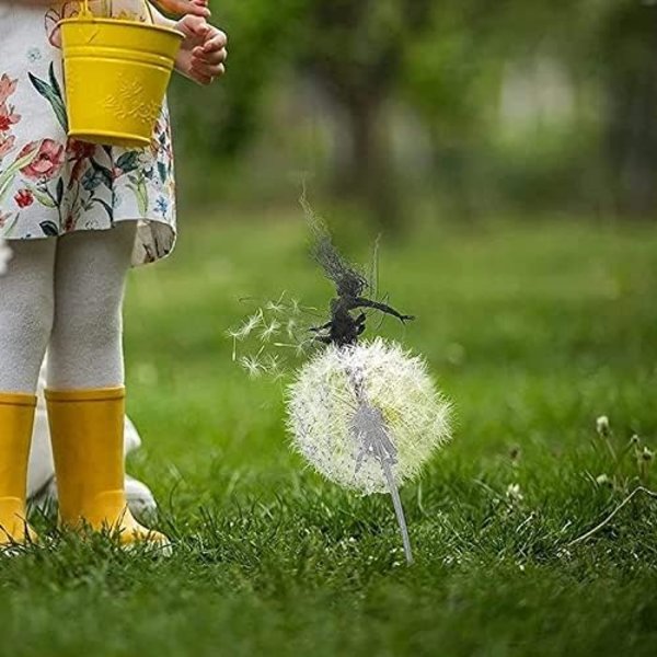 Blomma älva älva dansar med ängel maskros skulptur meta