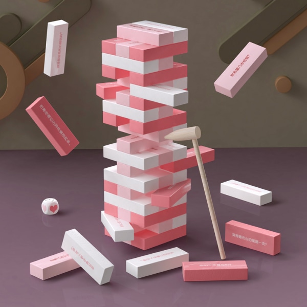 En eske med rosa Jenga balanseblokker i tre pedagogiske leker