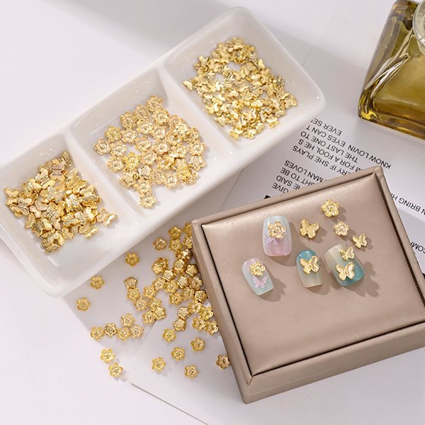 40 st Blommor Fjäril Nagelberlocker och Ädelstenar Metall Blommor Fjäril Nagelsmycken Berlocker Design 3D Guld Glänsande Kristall Nagelkonst Berlocker Strass
