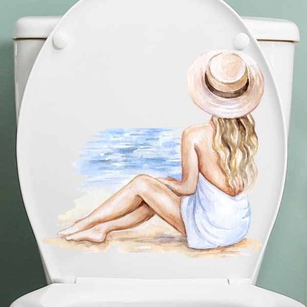 Vedenpitävä wc-tarra wc-istuimeen maalatun rantatytön selkänojaan