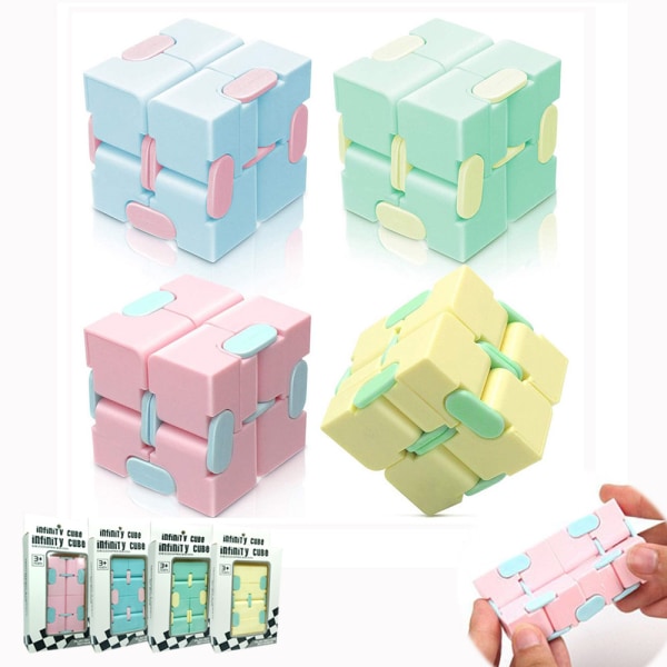 Rubiks kube (gul, grønn, rosa og blå) sett med fire