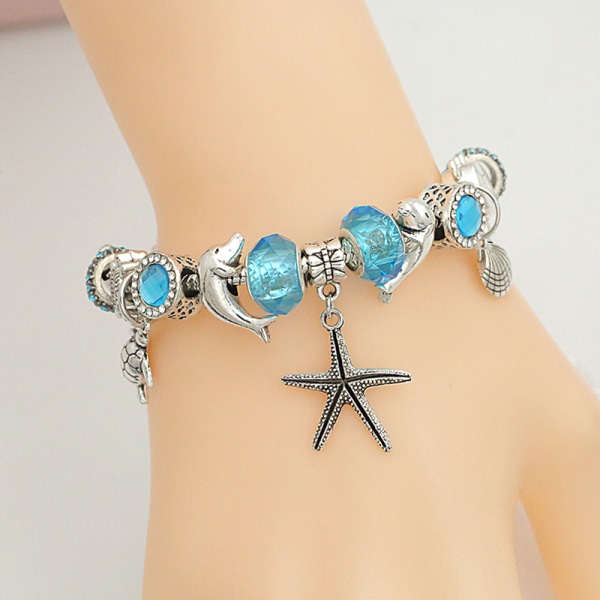 Blue sea, starfish, dolphins,Silver plated birthday charm br