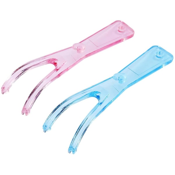 Set med 2 återanvändbara tandtrådshållare (rosa + blå)