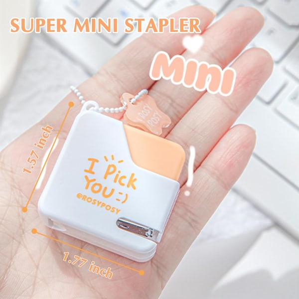 1 kpl Super Mini -nitoja nitojilla – Suloinen kuution muotoinen pöytänitoja, täydellinen toimistoon, kouluun, tytöille, opettajille, opiskelijoille, lahjaksi (Pinkki)