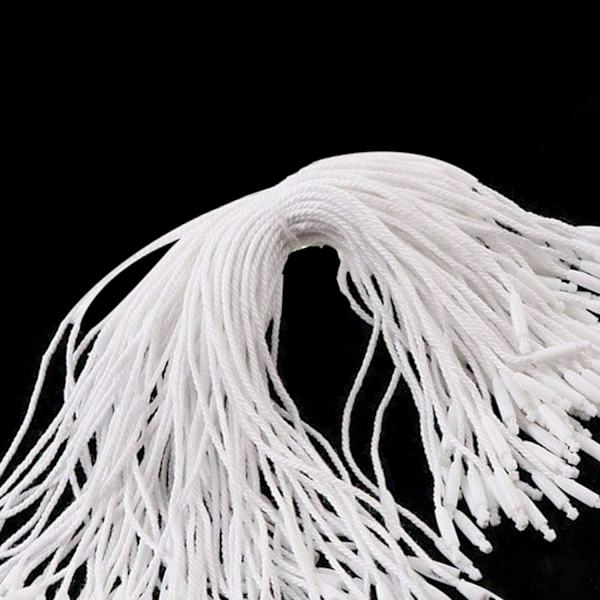 1000 kappaleen pakkaus valkoisia nylon-ripustuslappuja, 25 cm pitkiä - Nepparikiinnitys lappujen ja turvalappujen kiinnittämiseen -