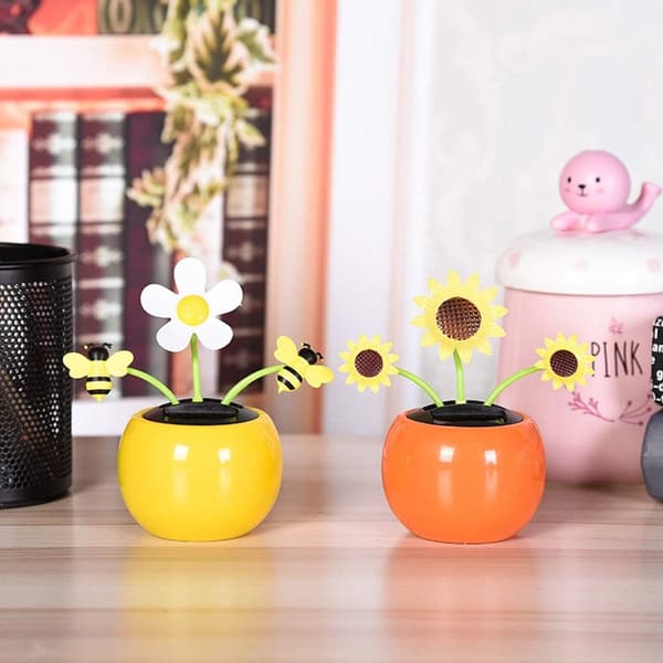 Solcelledansende blomst, 4 stk. plast solcelledansende blomster, der ryster
