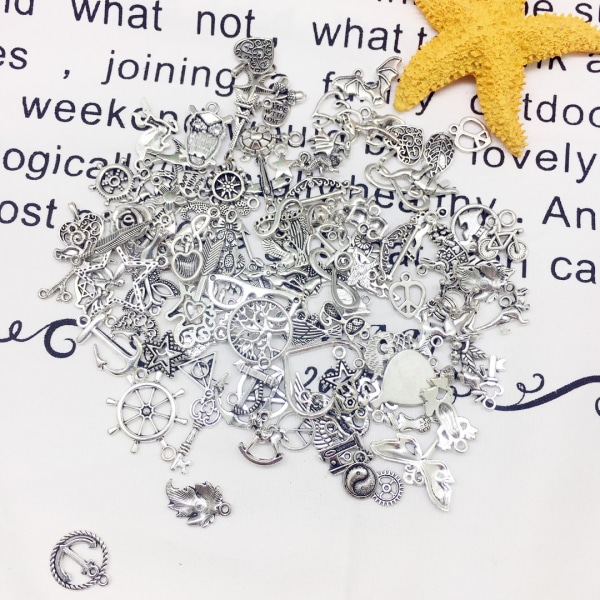 100 små silverlegering hängen halsband armband hänge örhängen handgjorda DIY material kit