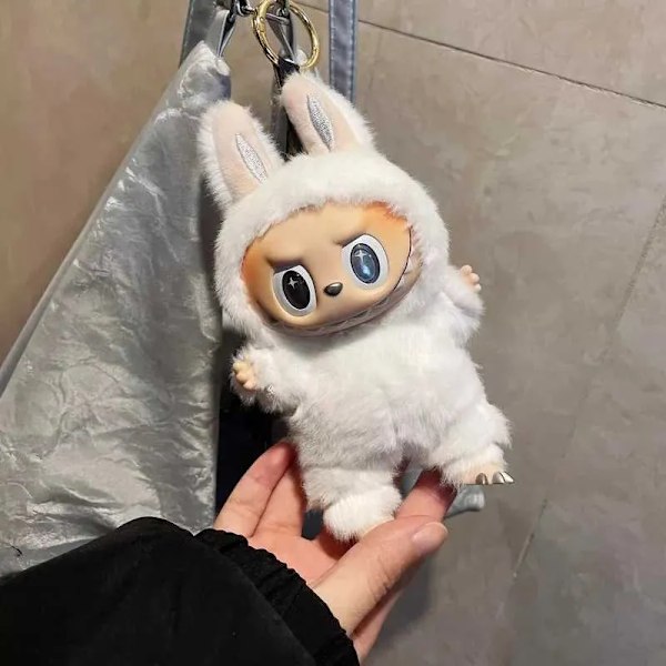 Högkvalitativ och söt Labubu Angel Wings serie vinyl docka blind box leksak ryggsäck hänge barn Nyårsgåva W250220.Ca