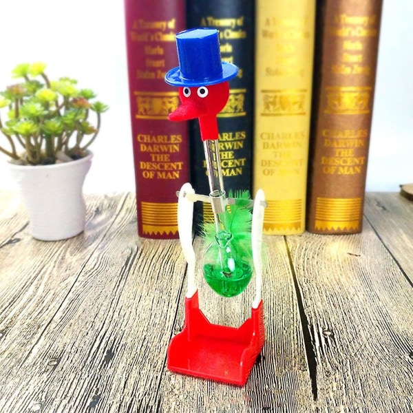 Renikh Creative Non-Stop flytande dricksglas Lucky Bird Duck Bobbing Magic Prank Toy[GL] Blue