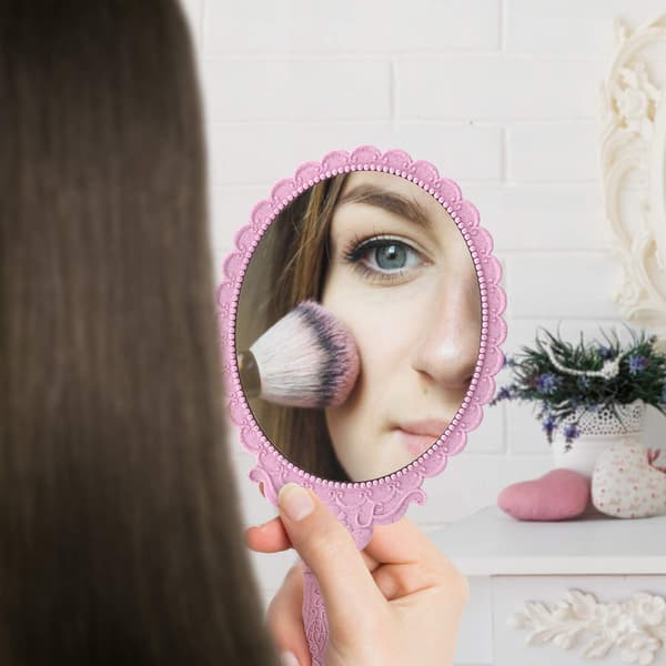Pink makeup mirror