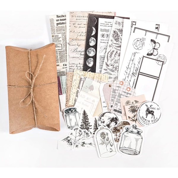 Förpackning med 32 ark scrapbookingpapper - dekorativa vintage och tidningsmaterial