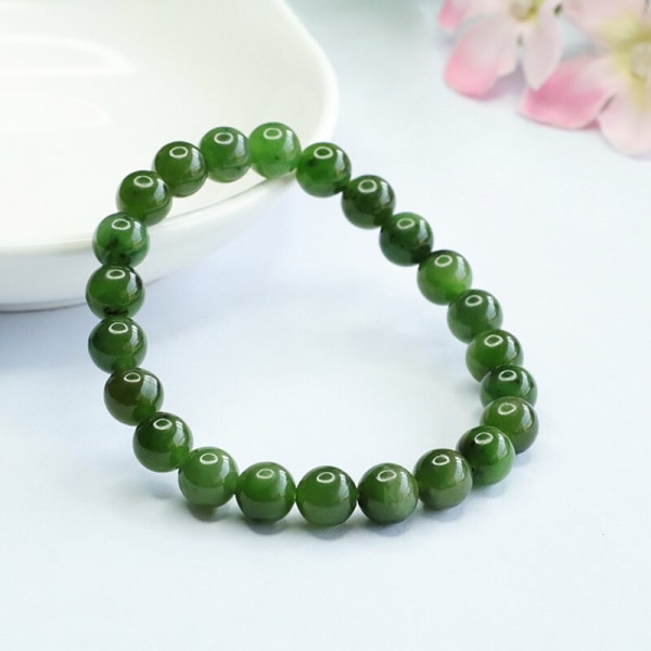 Naturlig nefritgrön Jade Armband Kvinnor Helande Ädelsten Fina Smycken Äkta Hetian Jades Pärlor Elastiska armband Armband 7mm