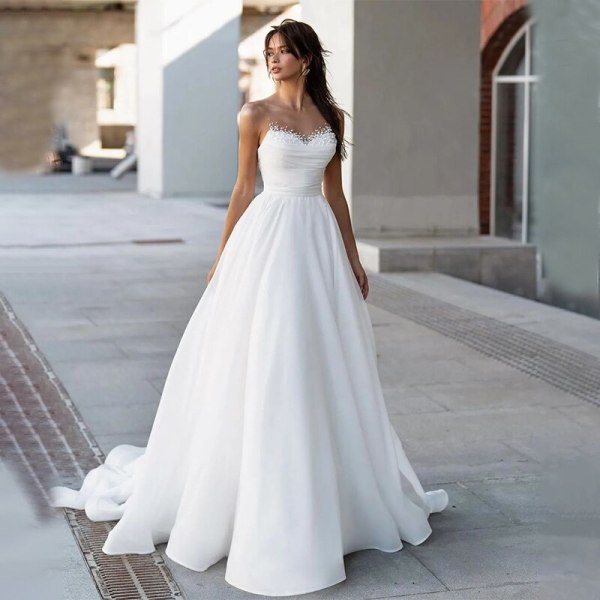 Enkla Sweetheart-ringning Bröllopsklänningar med hög slits Applikationer Ärmlösa A-line brudklänningar vestidos de novia robe de mariée ivory 12