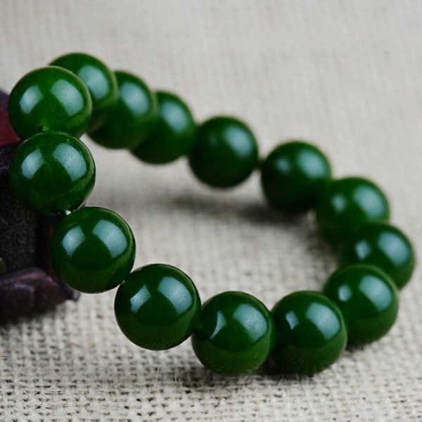 Naturligt Grönt Jade Armband Kvinnor Män Äkta Jades Stenpärlor Elastiska pärlor Armband Par Armband Tillbehör Smycken 12mm