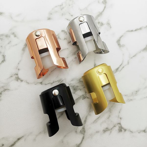 Champagnestopper i guld, designad i Frankrike, för mousserande vinflaskor