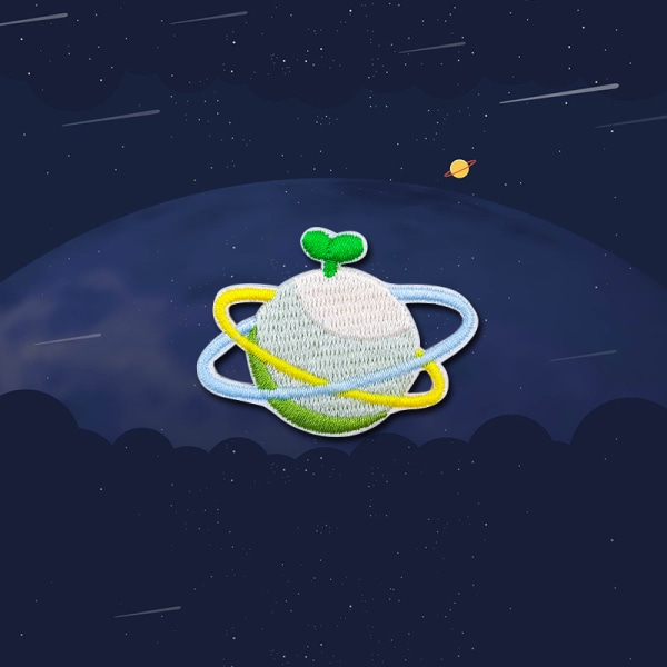 Set av 18 datorbroderade planettecknade astronautbroderier