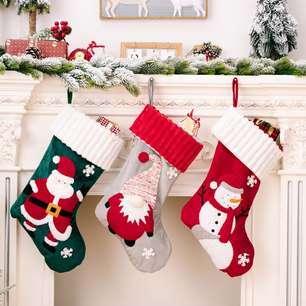 3-pack julstrumpor Tomte, snögubbe, renar, filt Ap