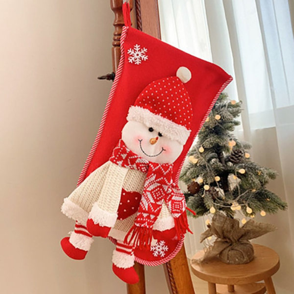 Julaktier Julklappspåse STRICKAD JOMTEMAN STICKAD Knitted Santa Claus