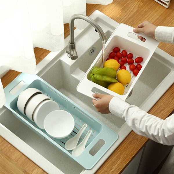 Köket infällbart dräneringsställ som dräneras blått white