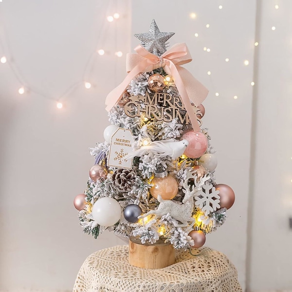 Pieni keinotekoinen joulukuusi, valaistu työpöydän joulupuu, jossa on puun latta ja koristeet joulukoristukseen (vaaleanpunainen)