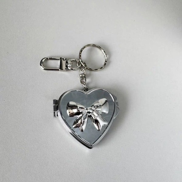3 portabla speglar nisch silver rosett kärlek nyckelring Y2K nisch väska hänge exklusiva accessoarer silver