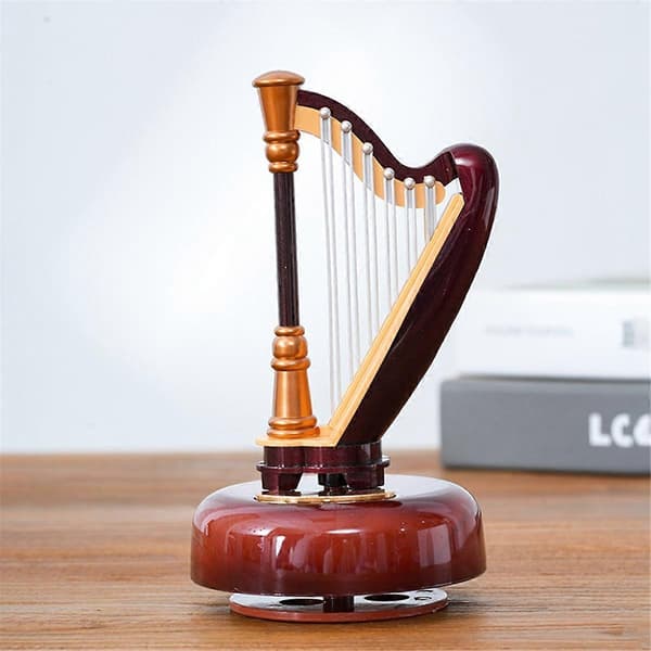 Literära och klassiska roterande speldoseprydnader, harpa
