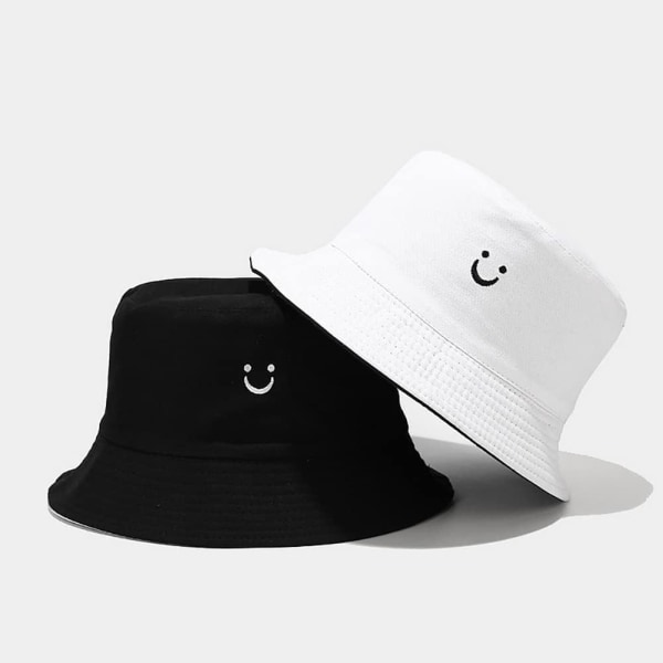 Söpö Bucket Hat Beach Fisherman hatut naisille, käännettävä kaksipuoleinen kuluminen Smiley Black White