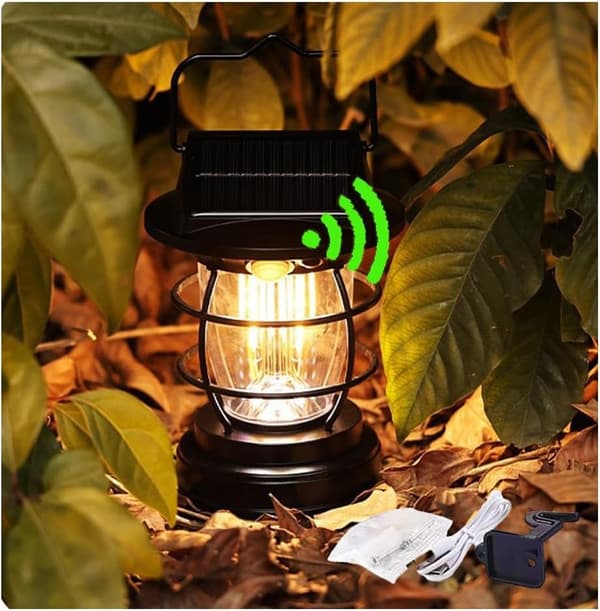 Solar-powered camping lamp with motion sensor, waterproof, 9 x 15.8 cm, black, dual charging mode