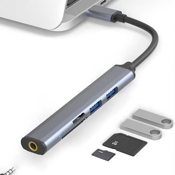 Fem-i-ett multifunktionell kortläsare expansionsdocka bärbar dator hörlurar höghastighets USB expansionsdocka (grå)